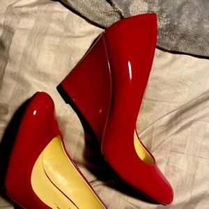 Worn once size 8 red wedge heels